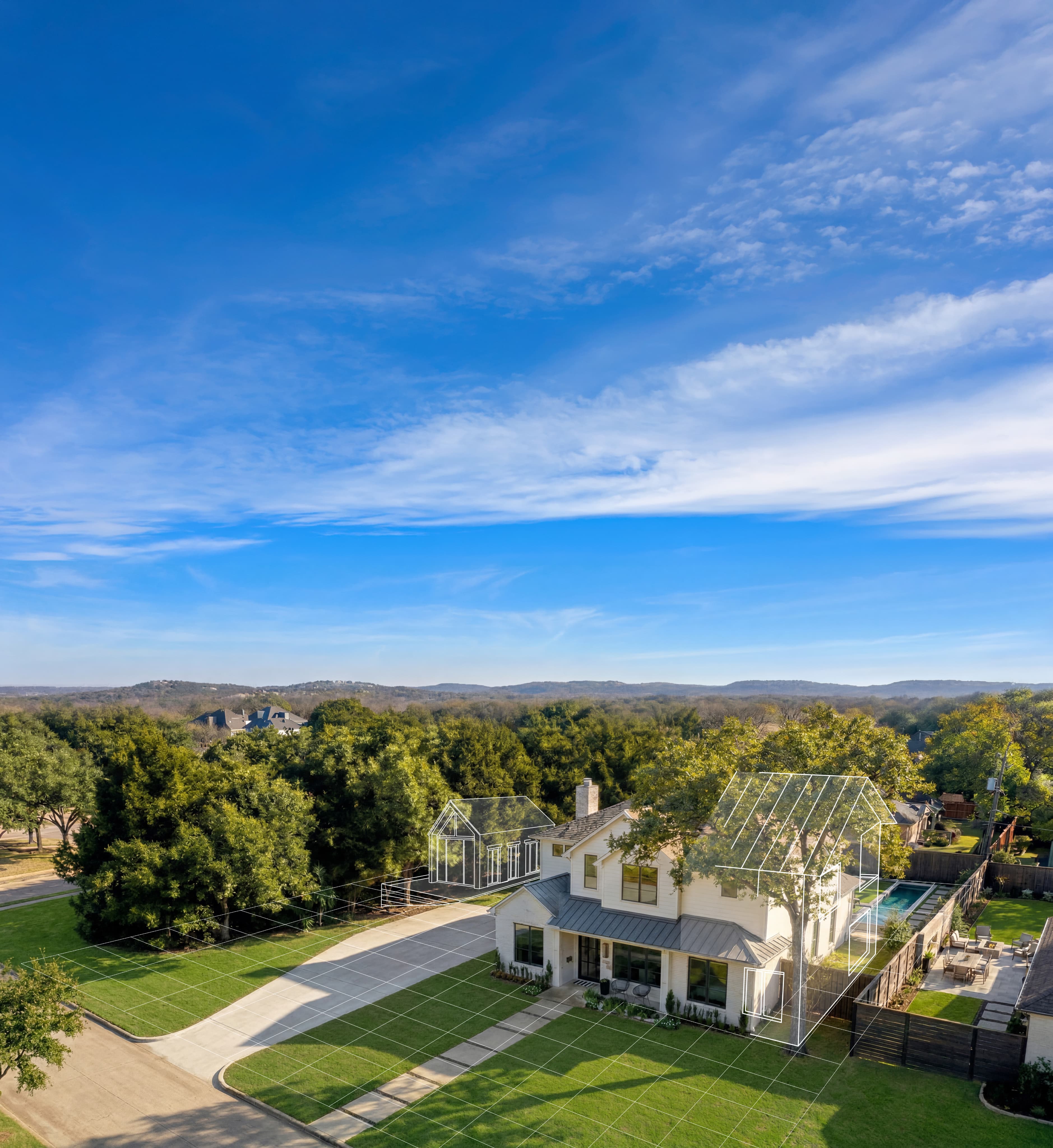 Aerial view of a white house with architectural overlay lines